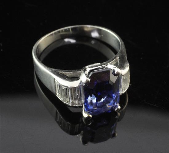 A platinum, sapphire and diamond ring, size N.